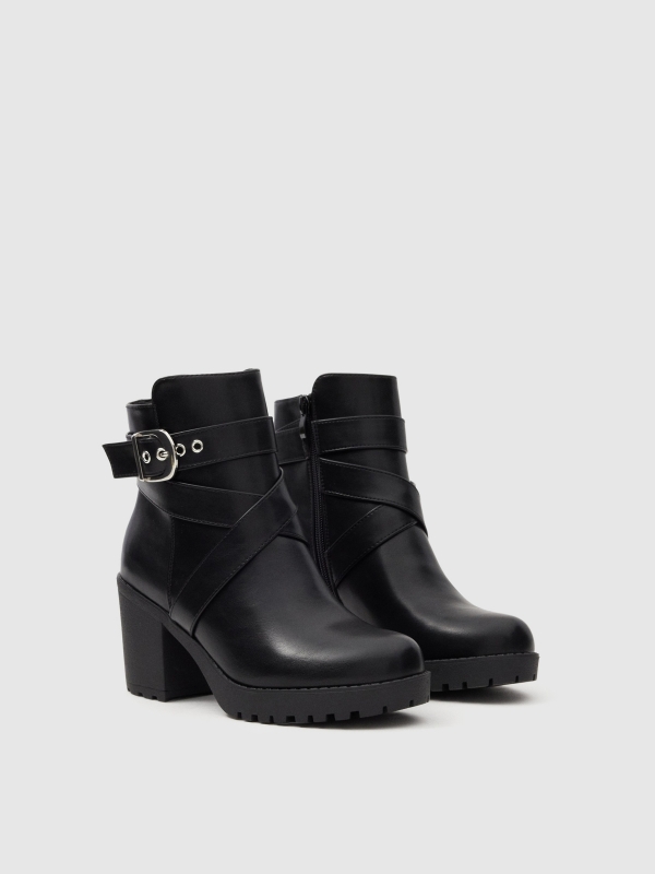 Heeled ankle boots with buckle 45º front view Heeled ankle boots with buckle 45º front view