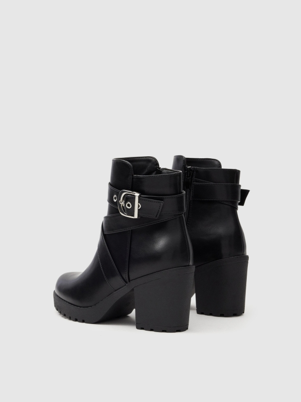 Heeled ankle boots with buckle 45º back view Heeled ankle boots with buckle 45º back view