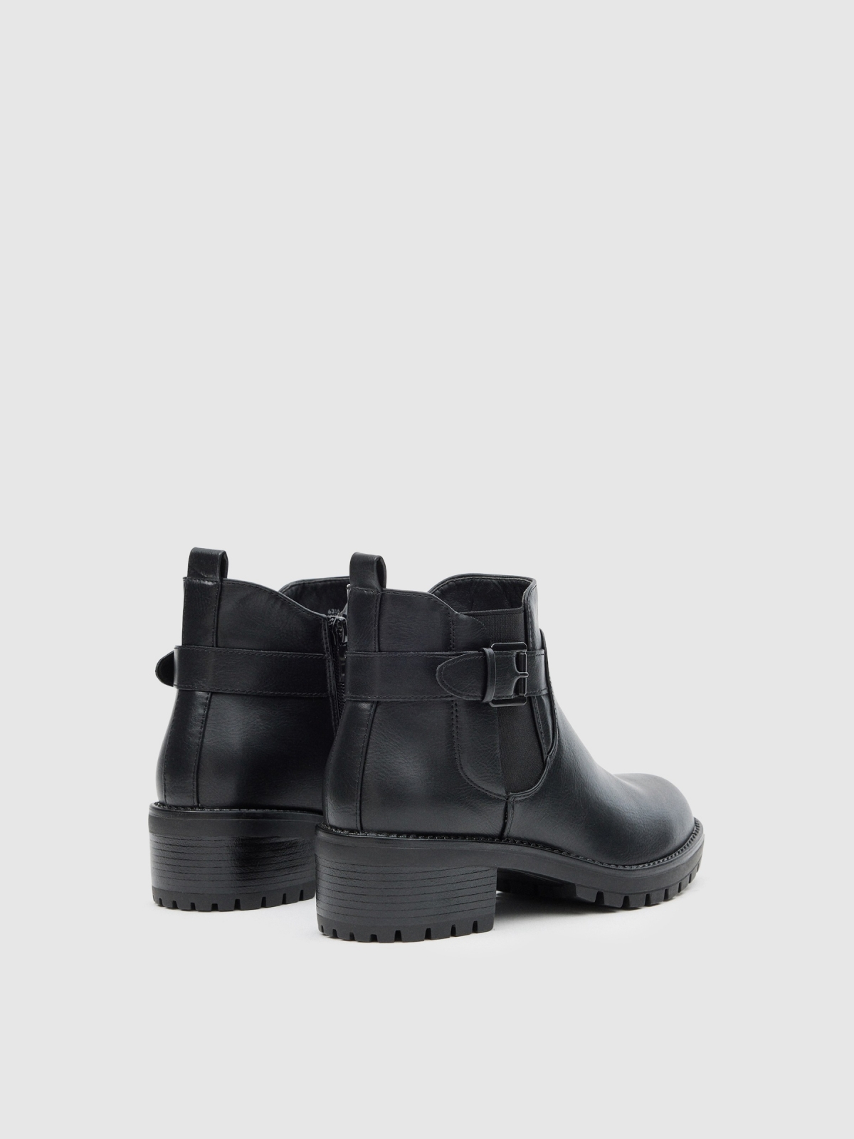 Ankle boots with buckle and elastics black 45º back view