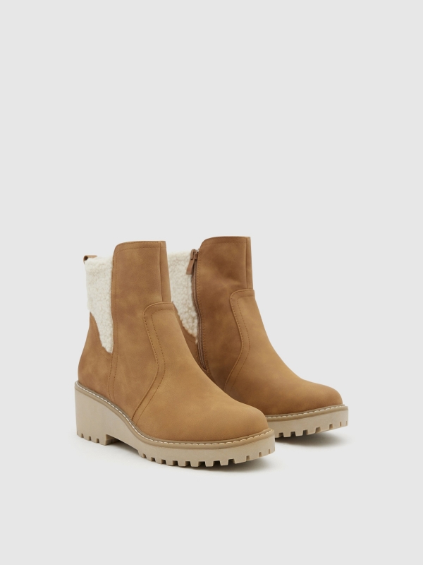 Wedge and sheepskin ankle boots brown 45º front view