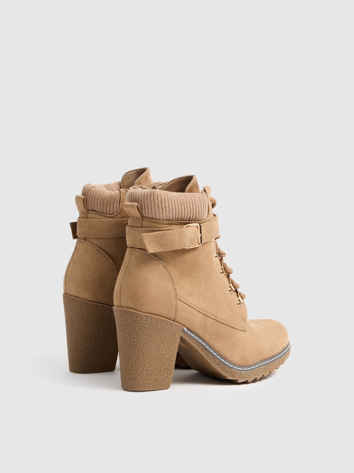 Brown ankle boots with heels beige 45º back view