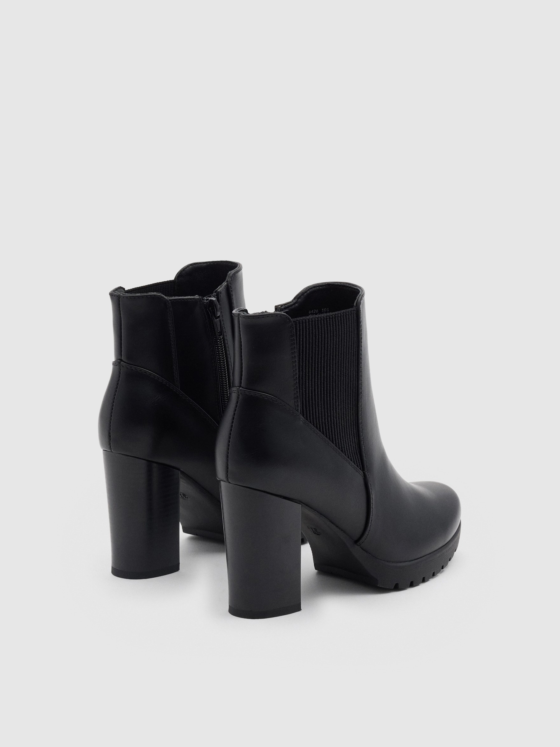 Heeled boots without closure black profile view