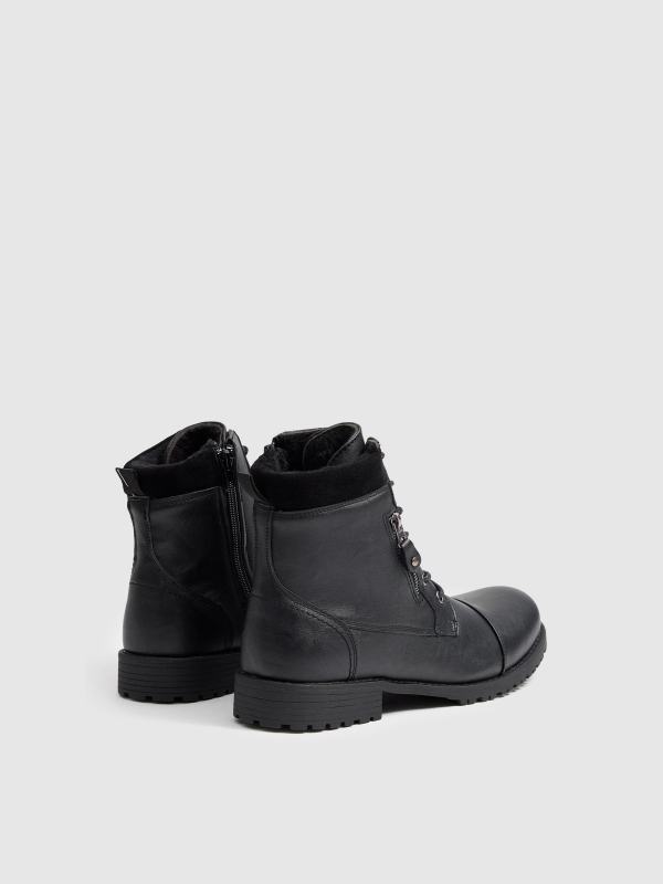 Black boot with zipper detail black 45º back view Black boot with zipper detail black 45º back view