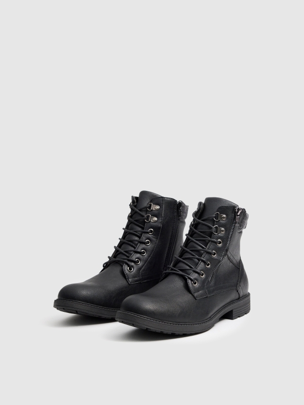 Black boot with zipper detail black 45º front view Black boot with zipper detail black 45º front view