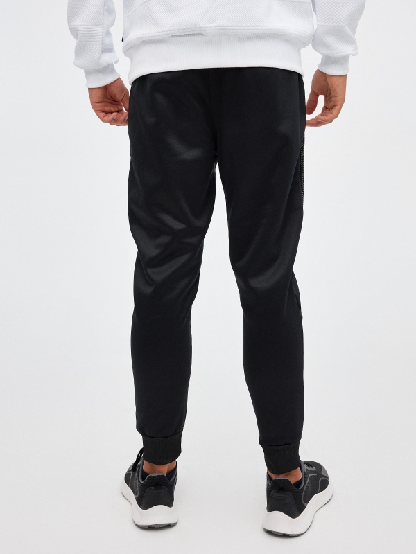 Black jogger pants black middle back view Black jogger pants black middle back view
