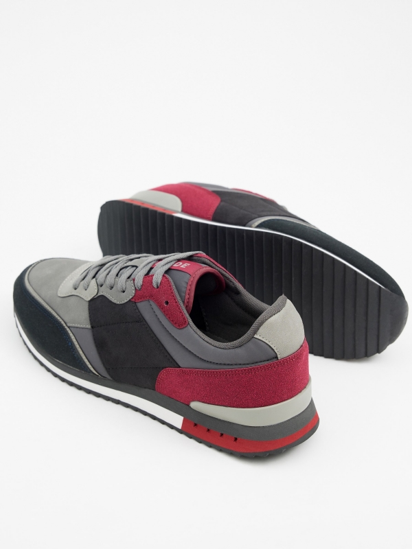 Tênis cinza com peças combinadas cinza vista detalhe Tênis cinza com peças combinadas cinza vista detalhe