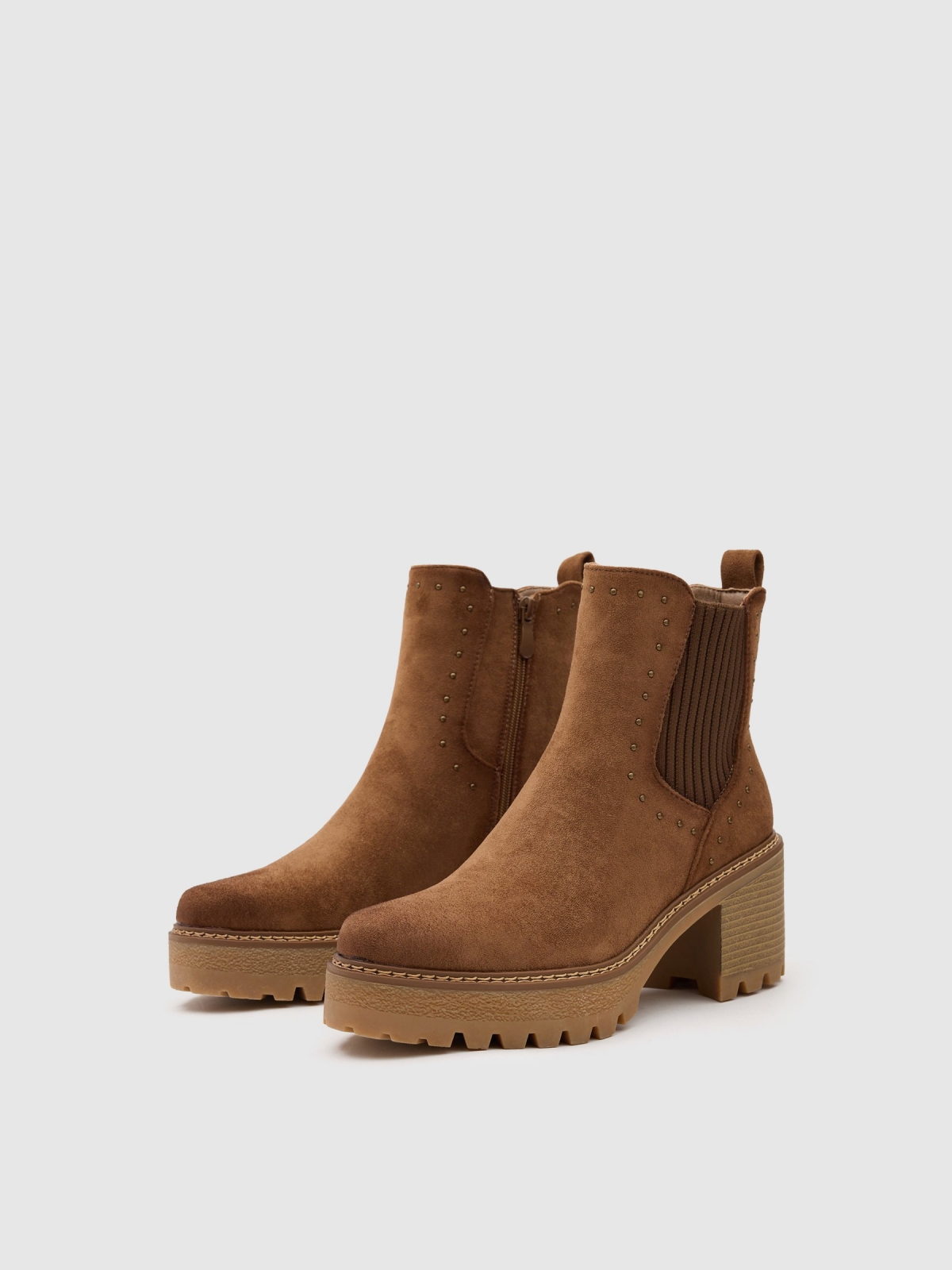 Platform ankle boots with studs brown 45º front view Platform ankle boots with studs brown 45º front view