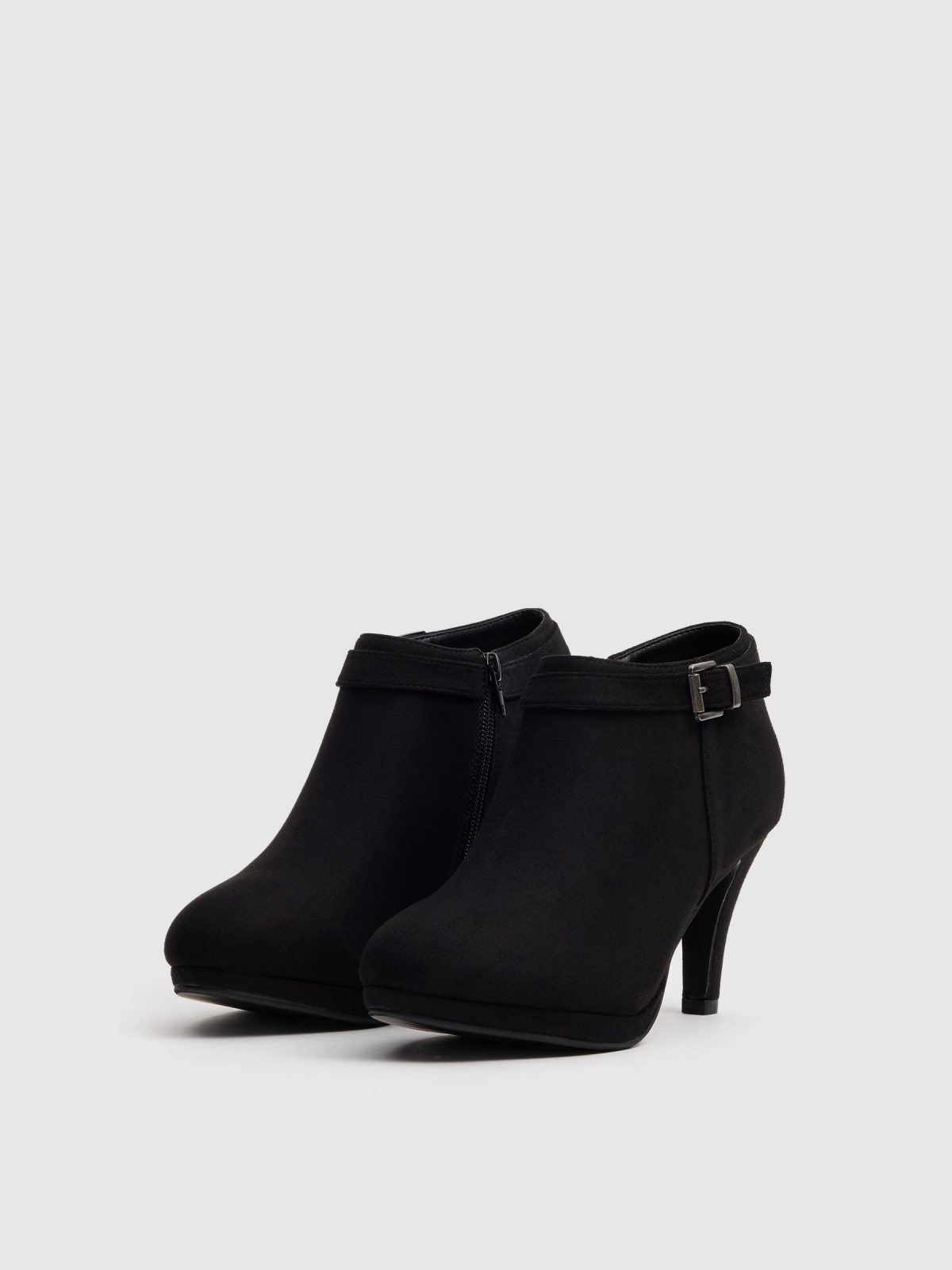 Black ankle boots with buckle and heel black 45º front view