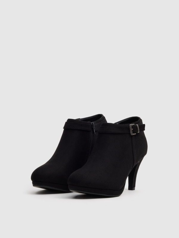 Black ankle boots with buckle and heel black 45º front view