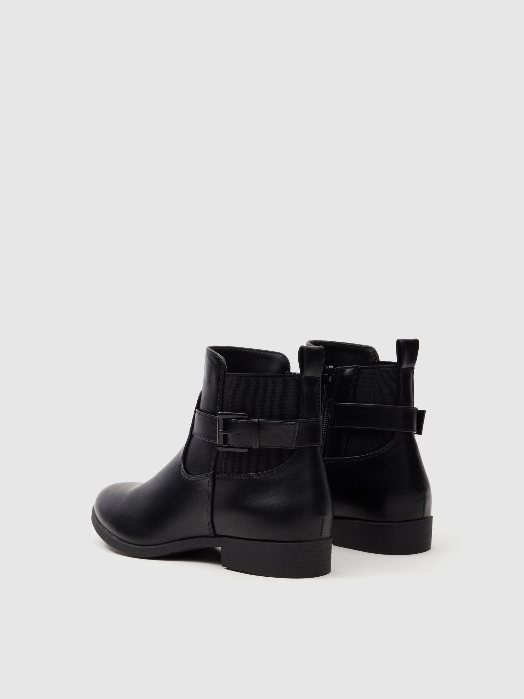 Elastic and buckle ankle boots black