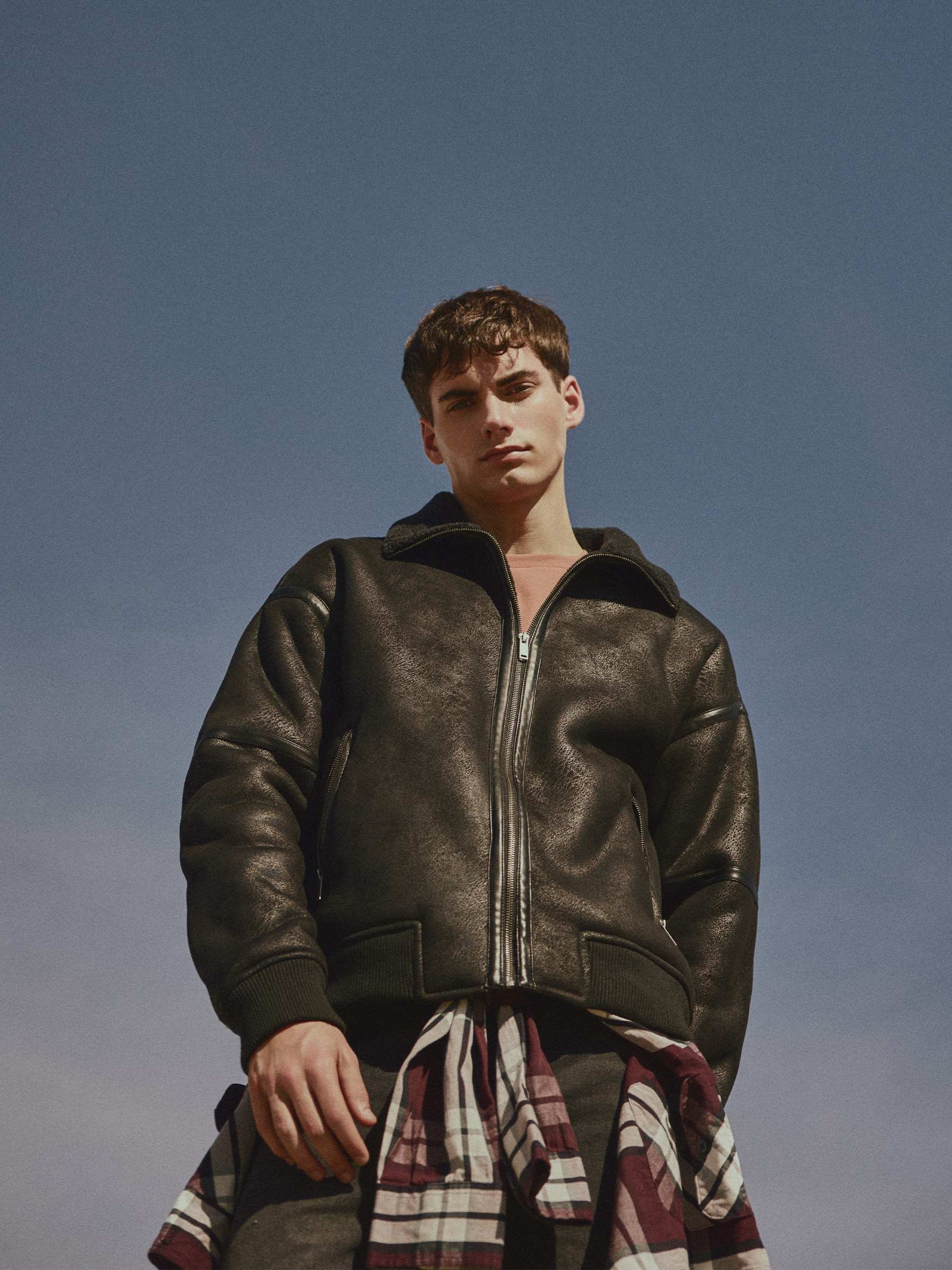 Faux leather jacket combined with shearling black middle front view