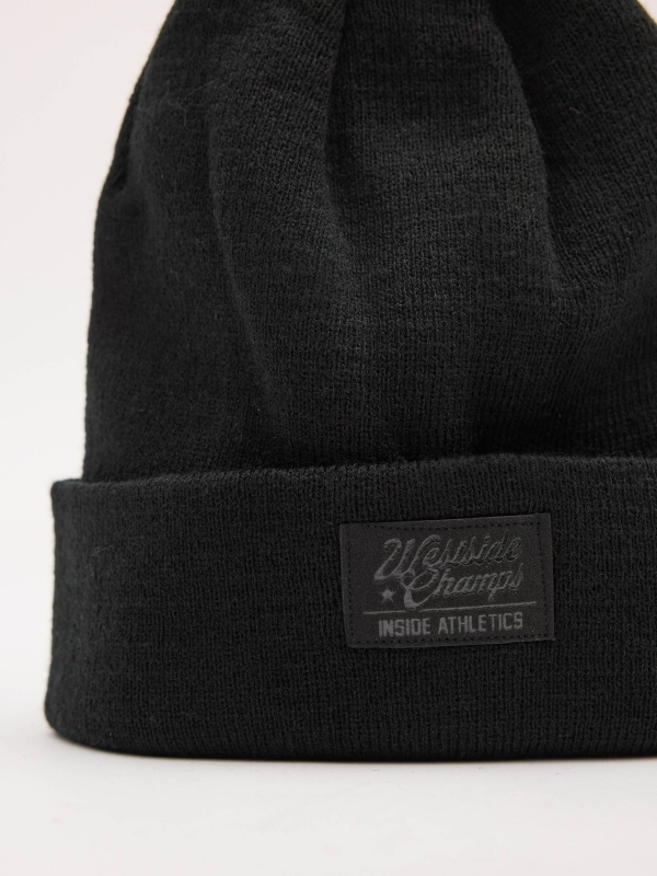Basic black rolled-up beanie black 45º back view