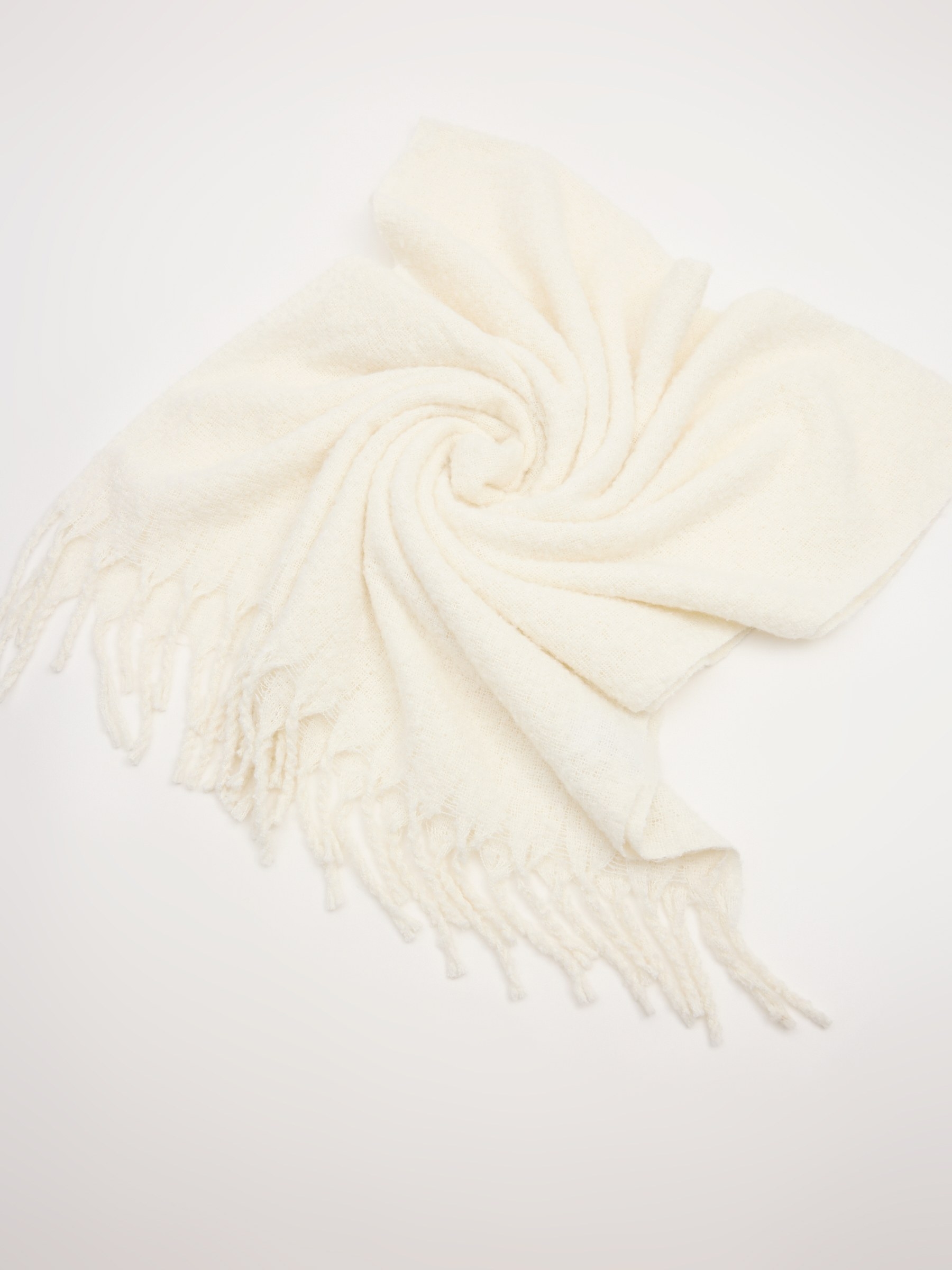 White fringed scarf beige rolled view