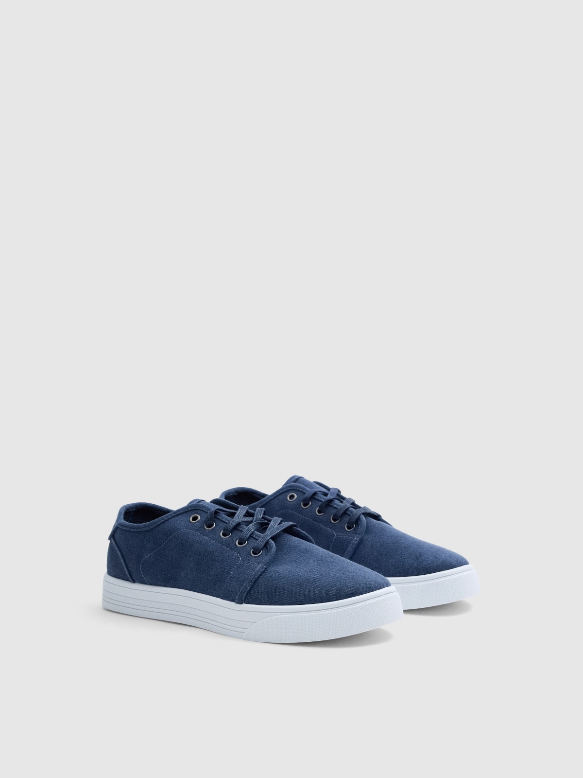 Navy blue canvas sneakers navy 45º front view