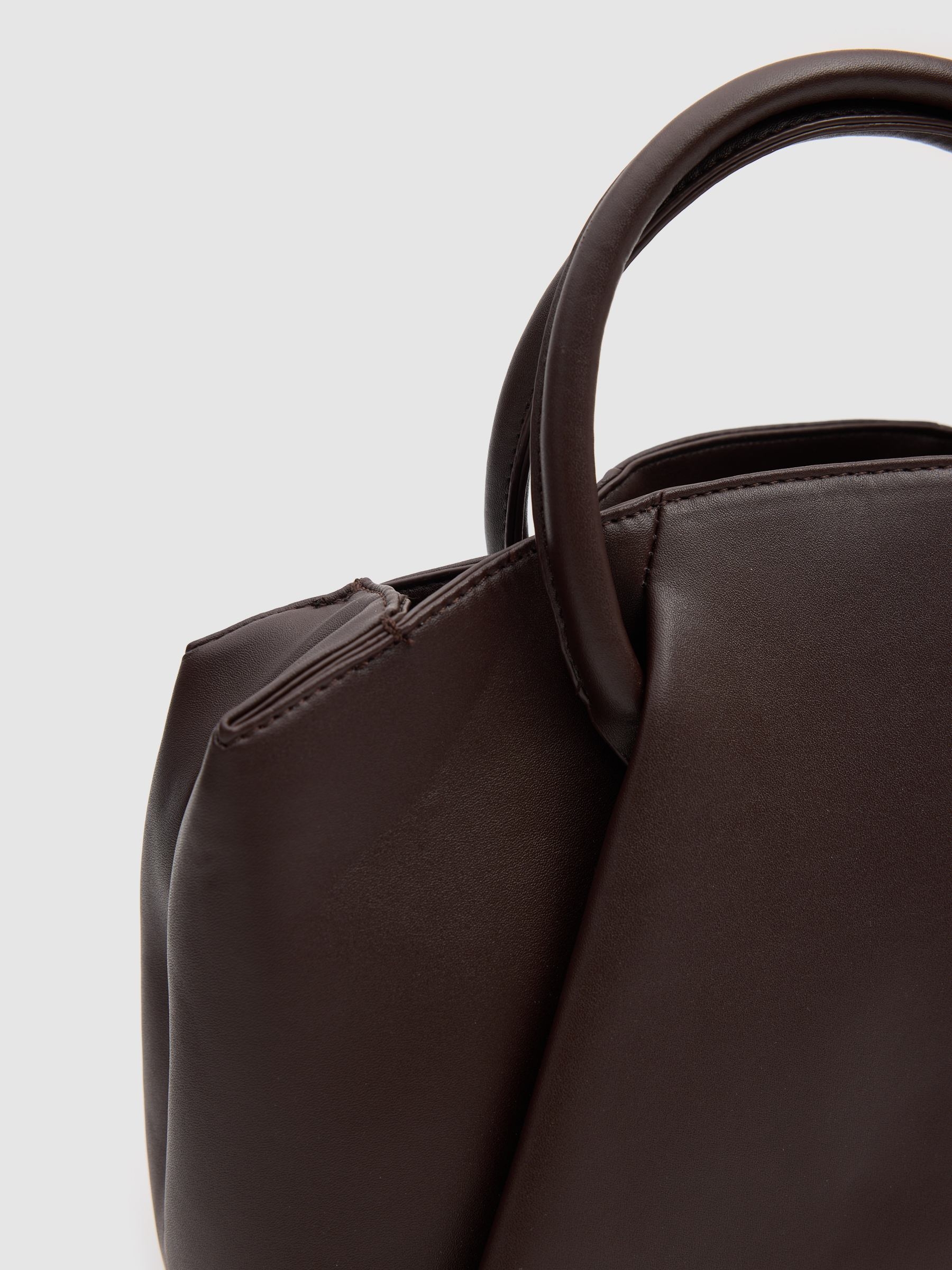 Brown faux leather bag brown front view