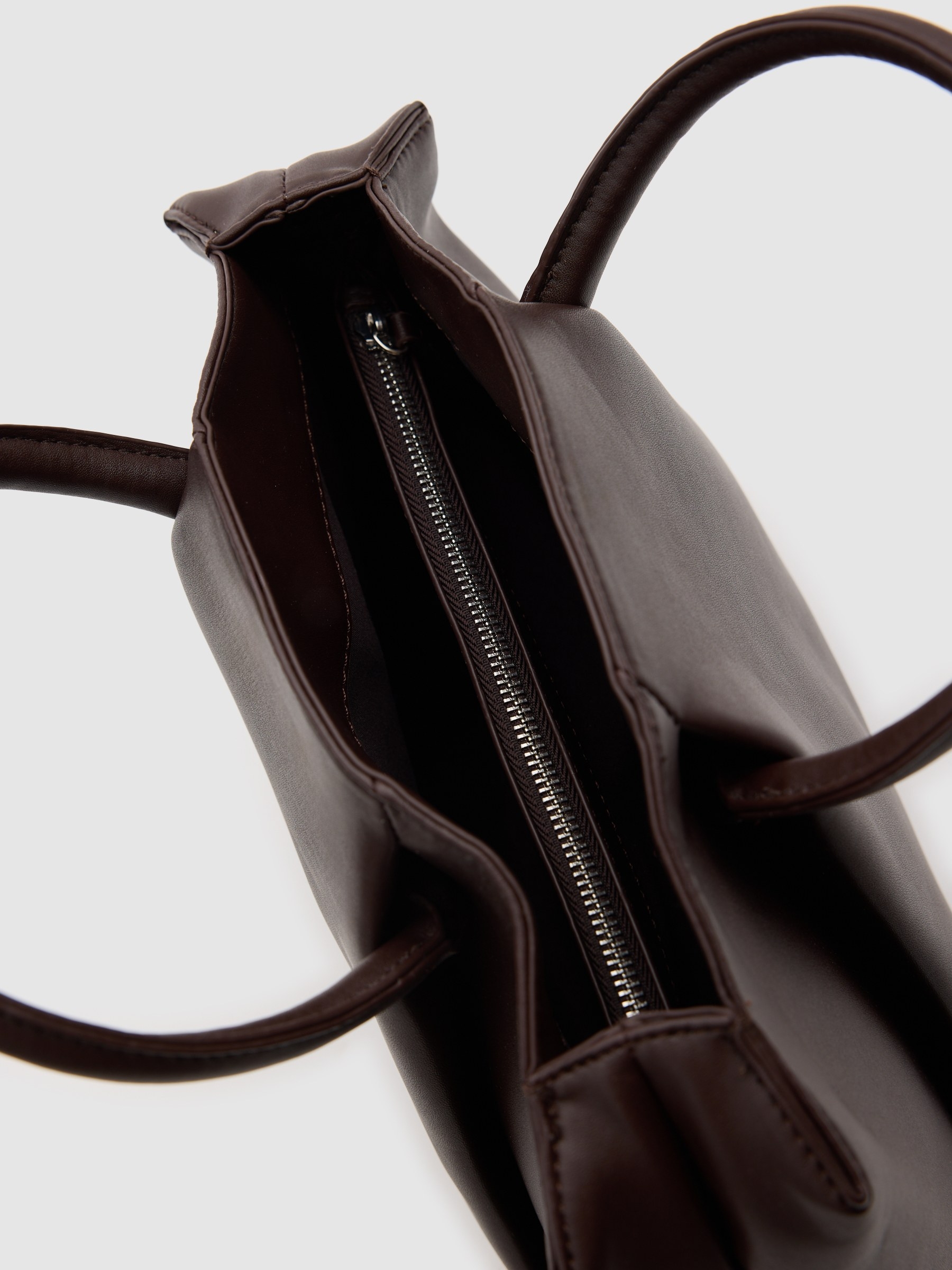 Brown faux leather bag brown front view