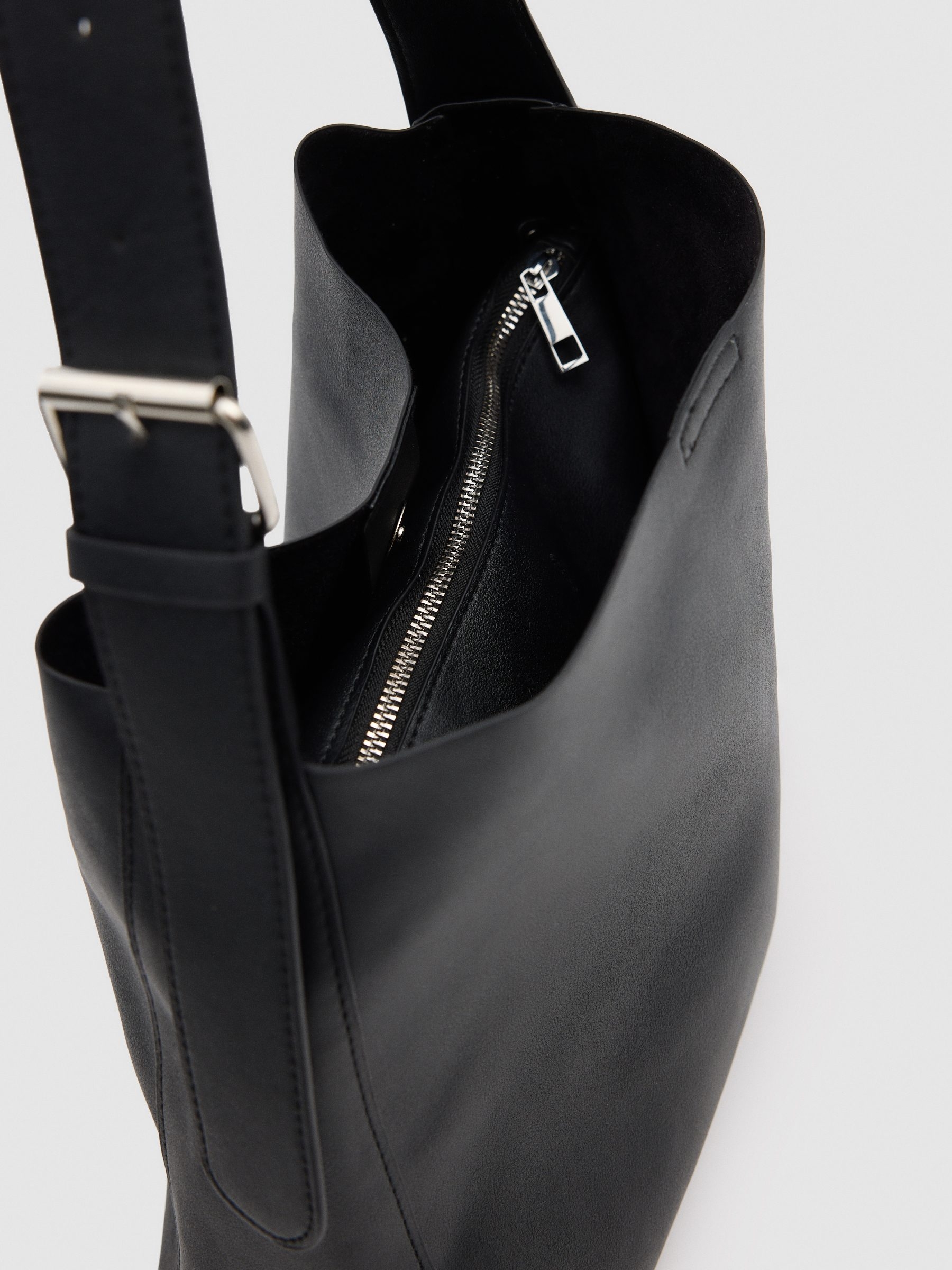 Black faux leather bag black front view