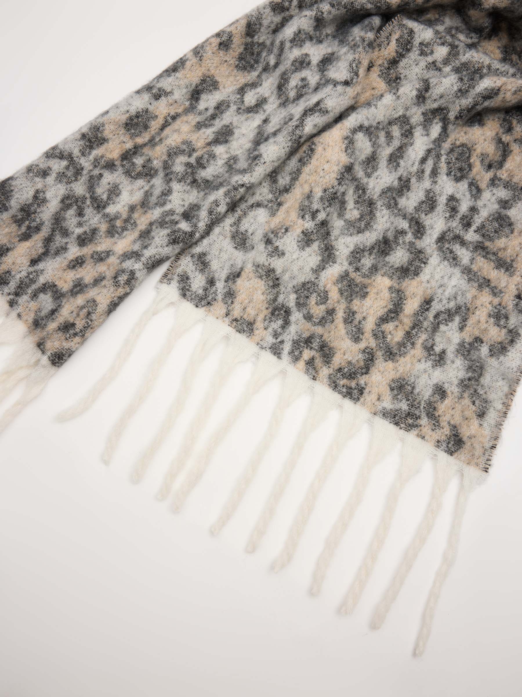 Bufanda manta animal print multicolor vista enrollada