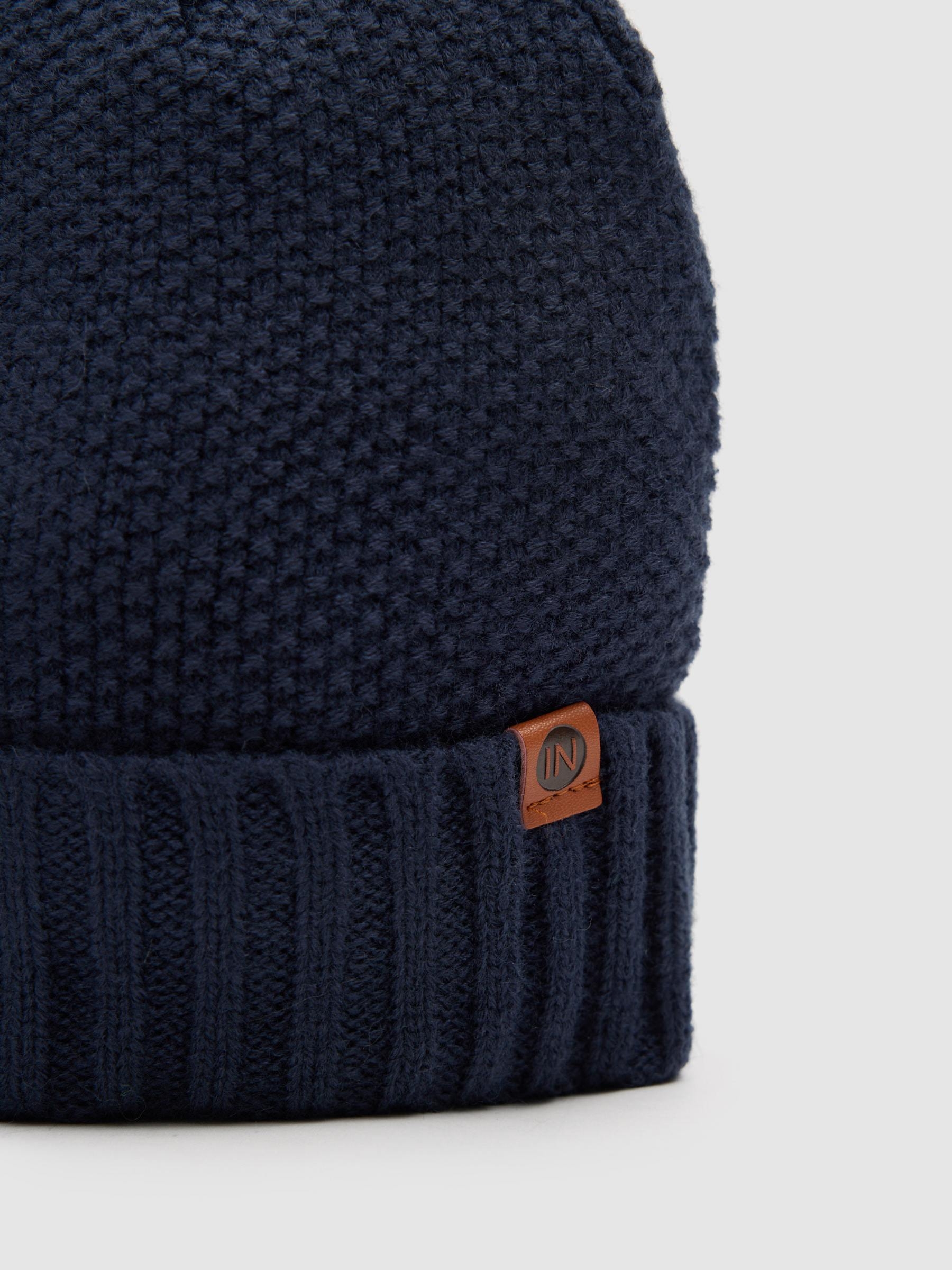 Gorro punto forro polar azul marino vista lateral frontal 45º