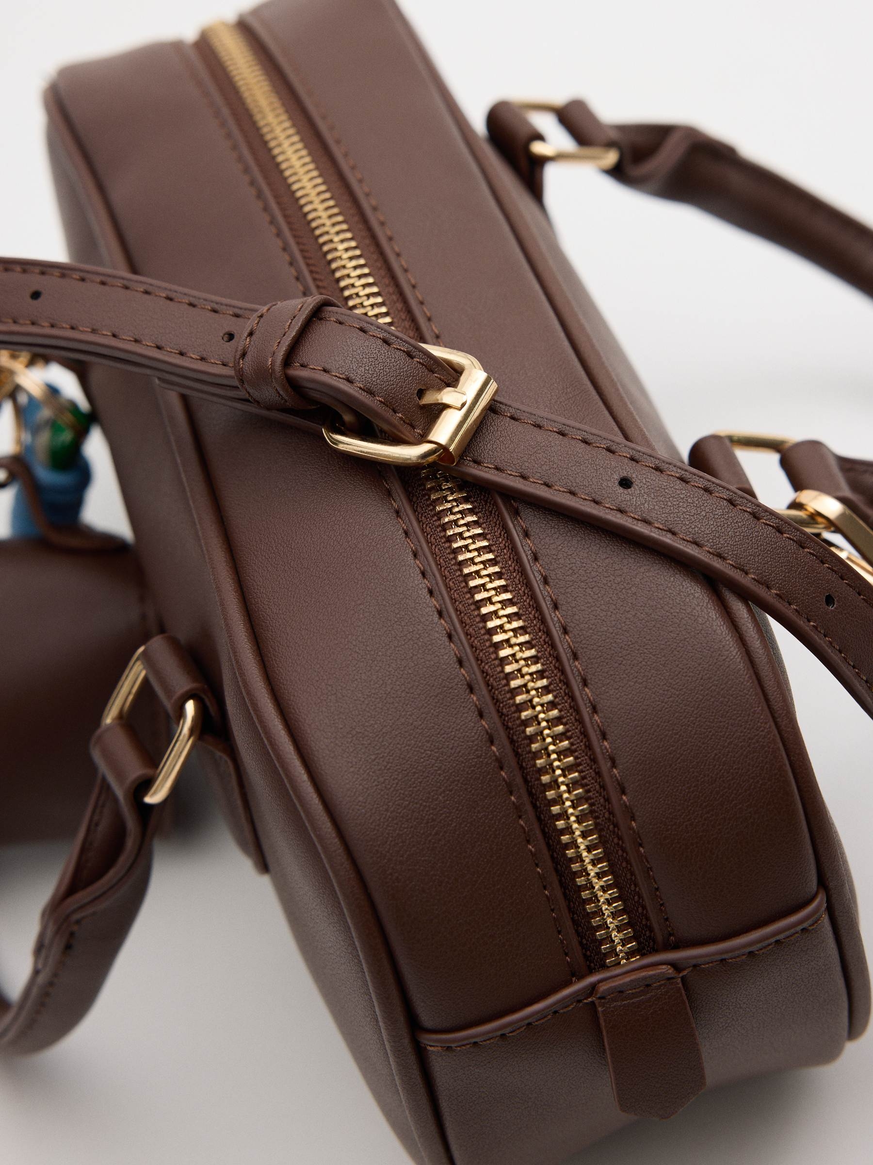 Brown faux leather bag brown front view