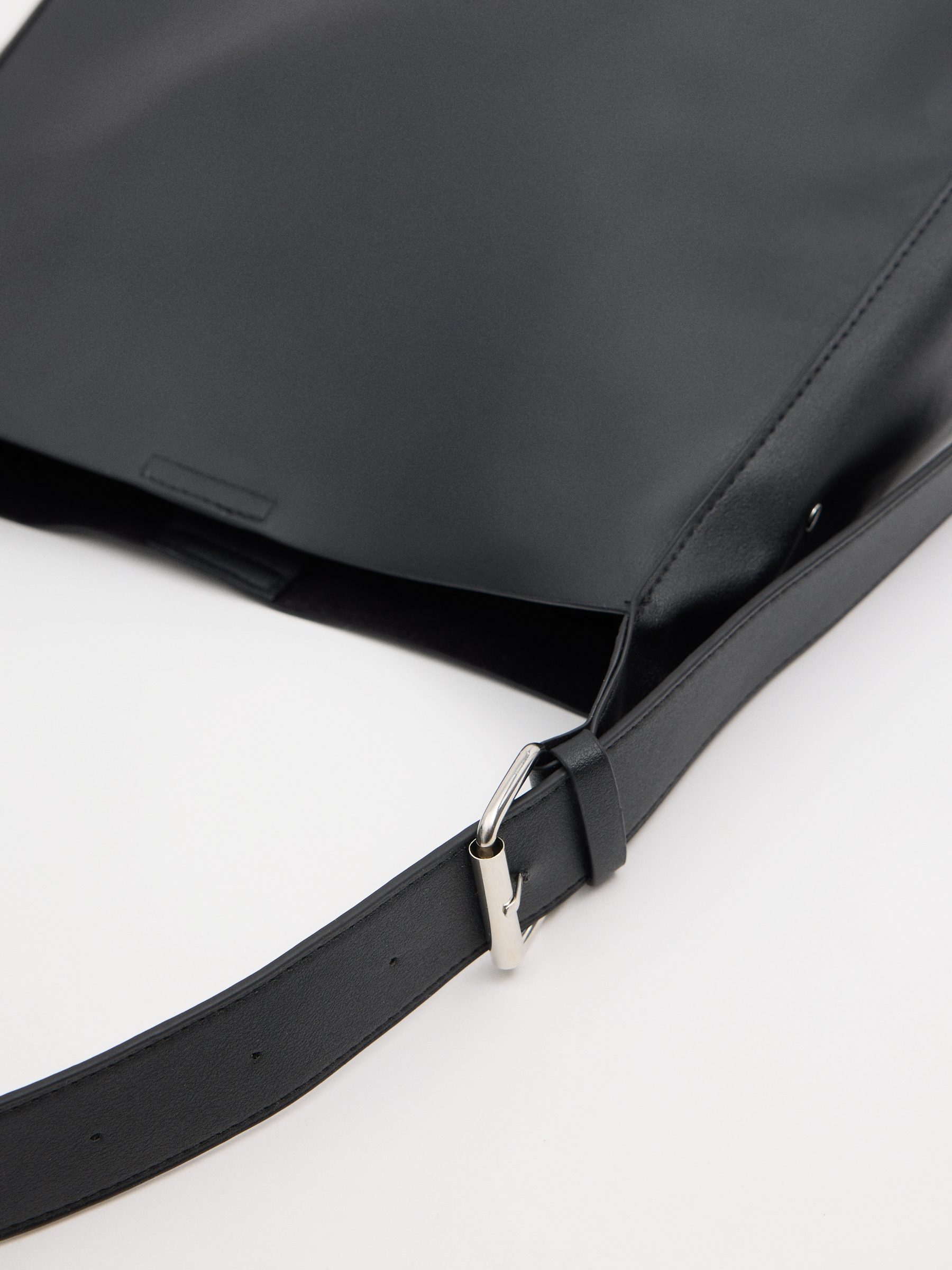 Black faux leather bag black front view