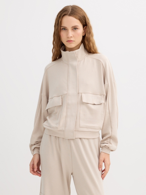 Jacket with faux leather pockets beige middle front view