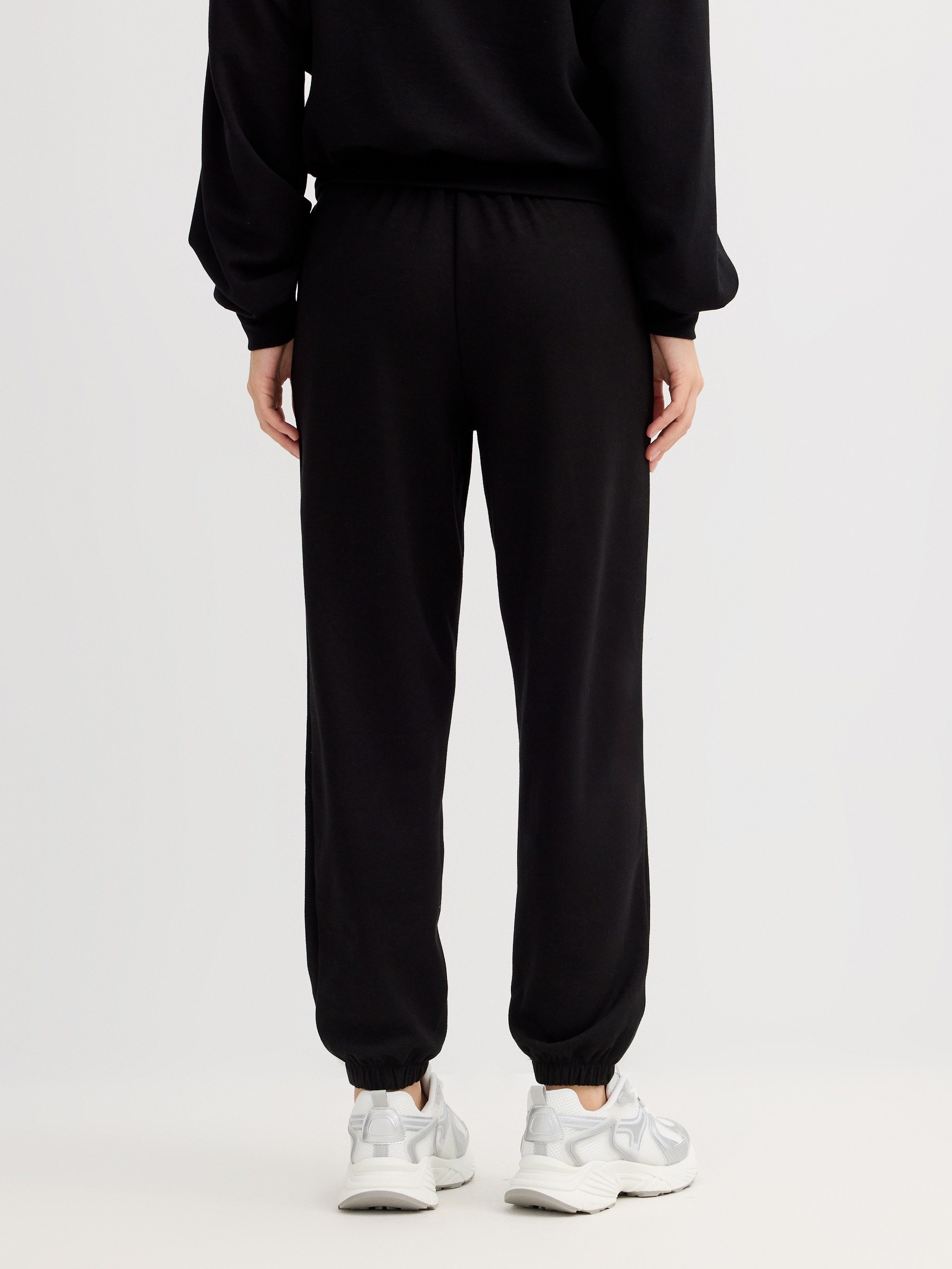 High-waisted sports jogger black front view