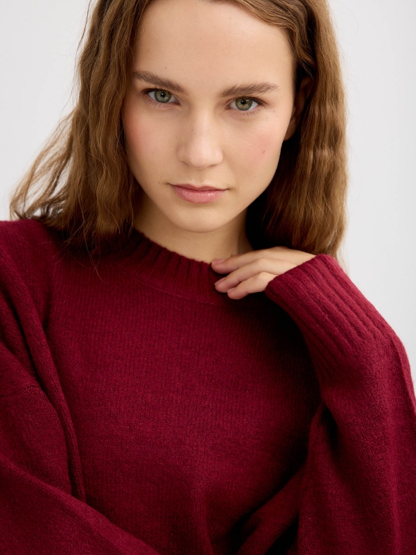 Casual jersey knit round neck garnet detail view