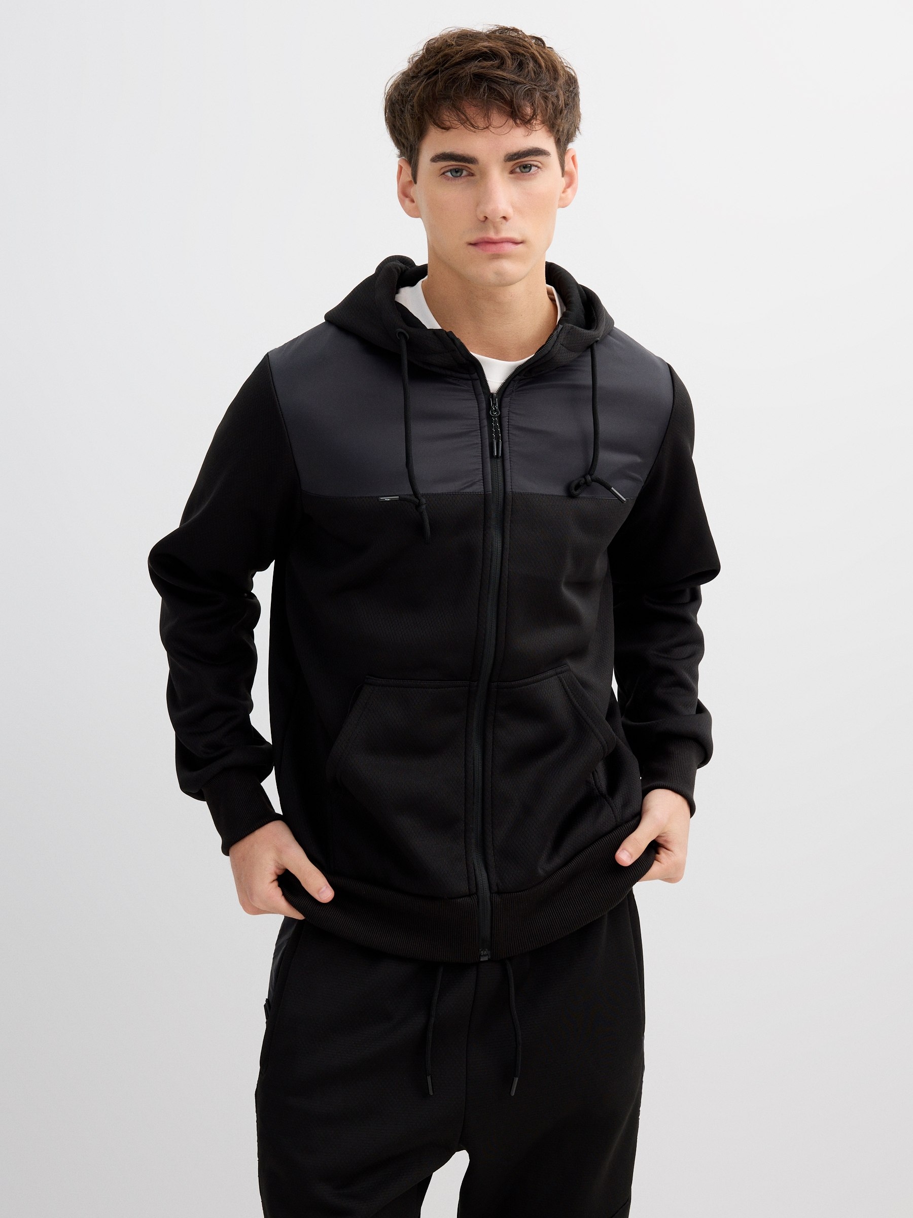 Sports hoodie with leather effect black middle front view