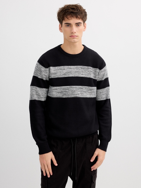 Striped knit sweater with a round neck black middle front view