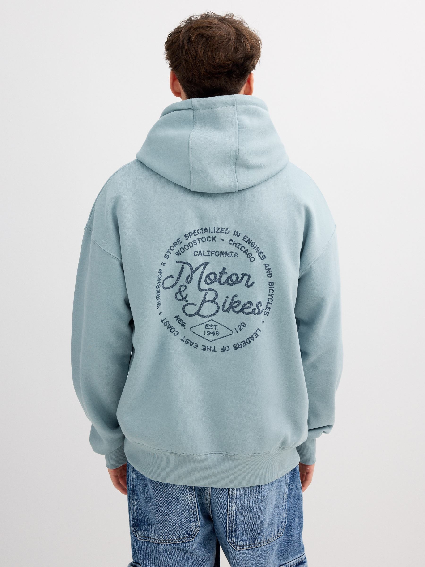 Sudadera felpa oversized con capucha azul vista media frontal