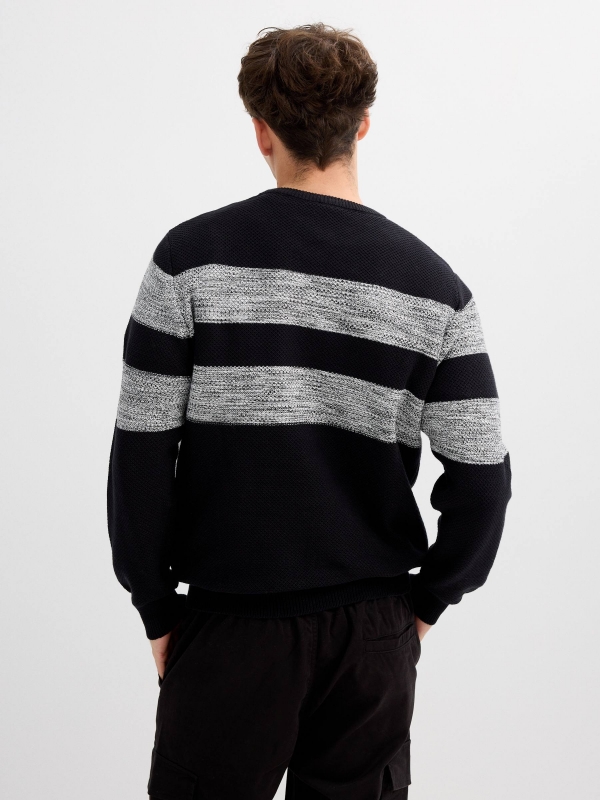 Striped knit sweater with a round neck black middle back view