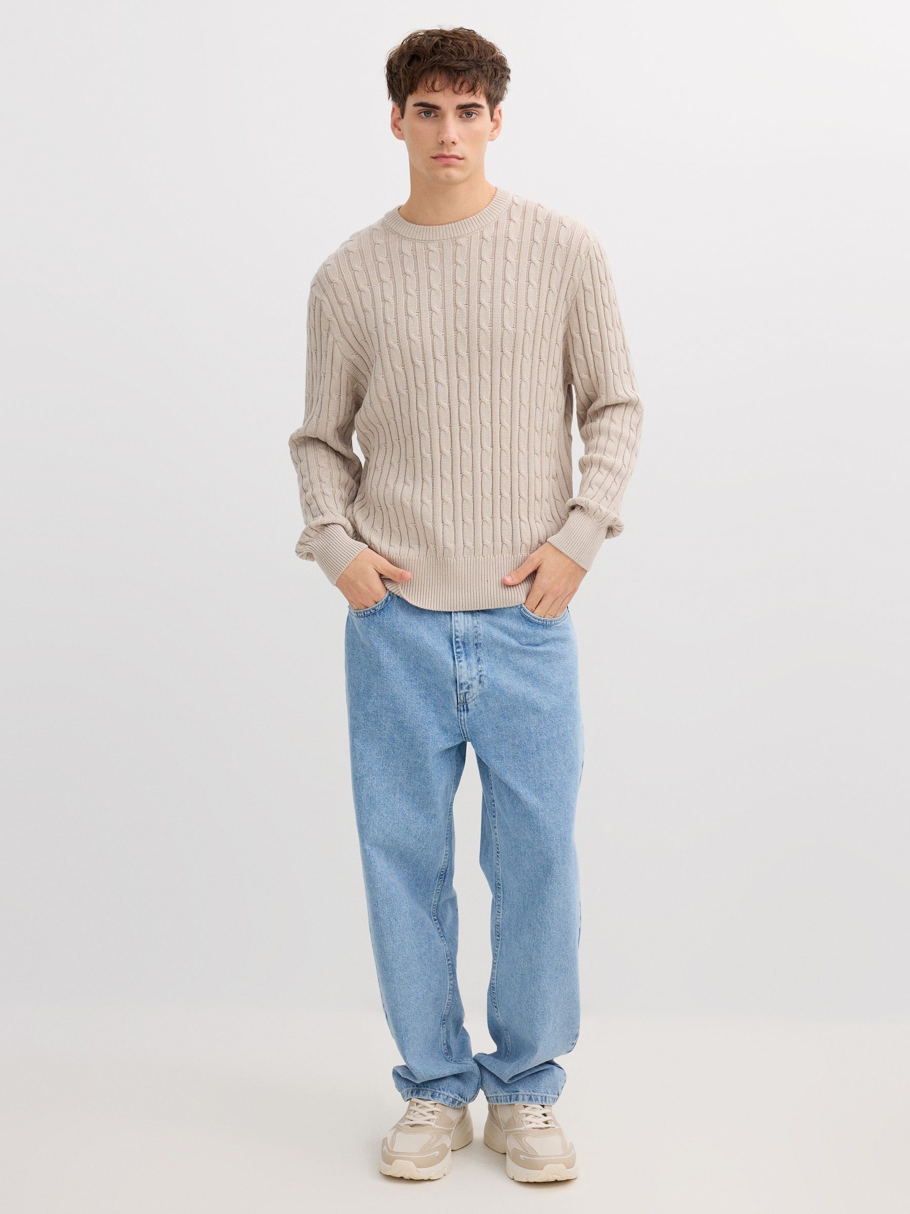 Round neck knit sweater raw middle front view