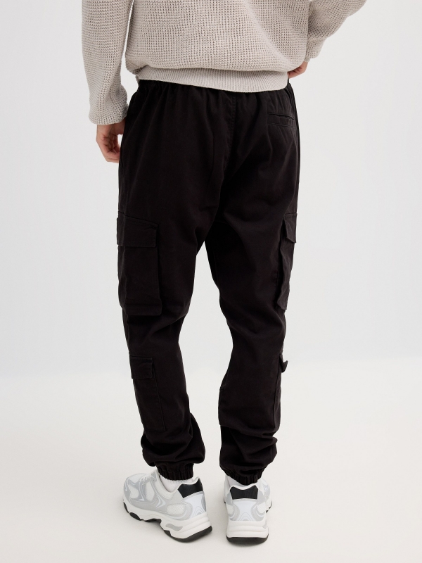 Jogger cargo beige black middle back view