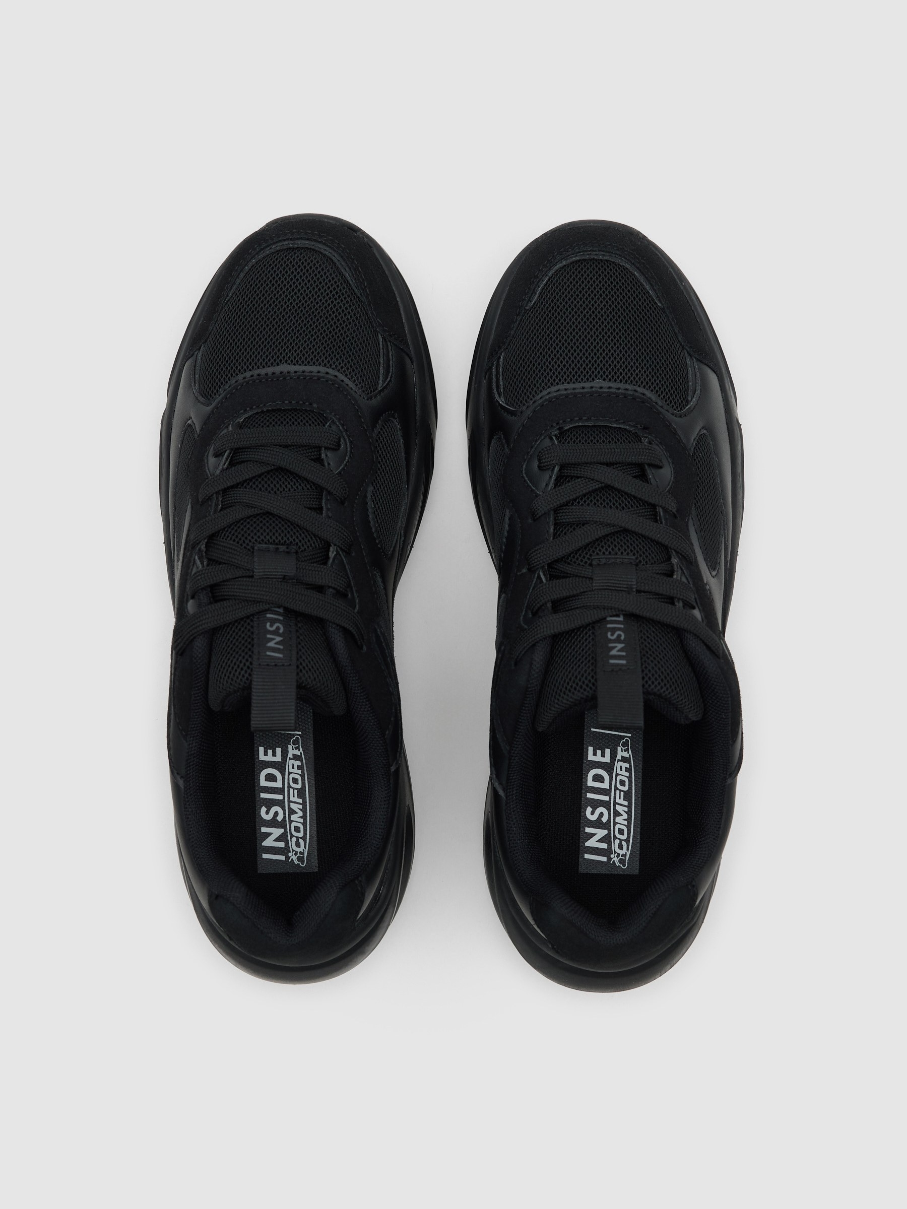 Sporty nylon combined with black leather effect black