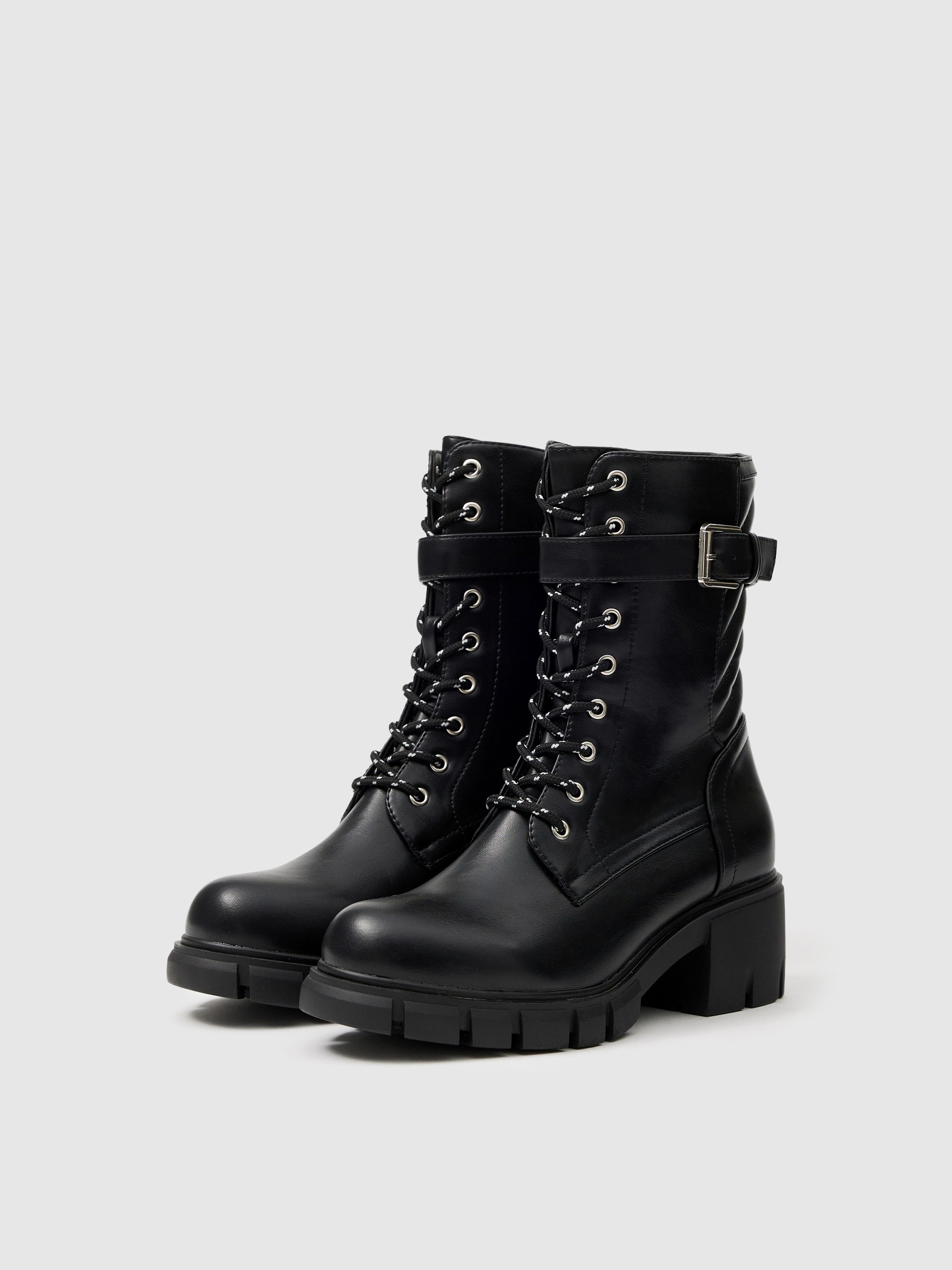 Buckle track sole ankle boot black