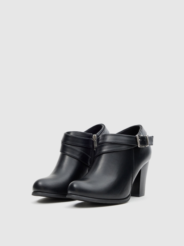 Patent leather ankle boots with buckle black 45º front view