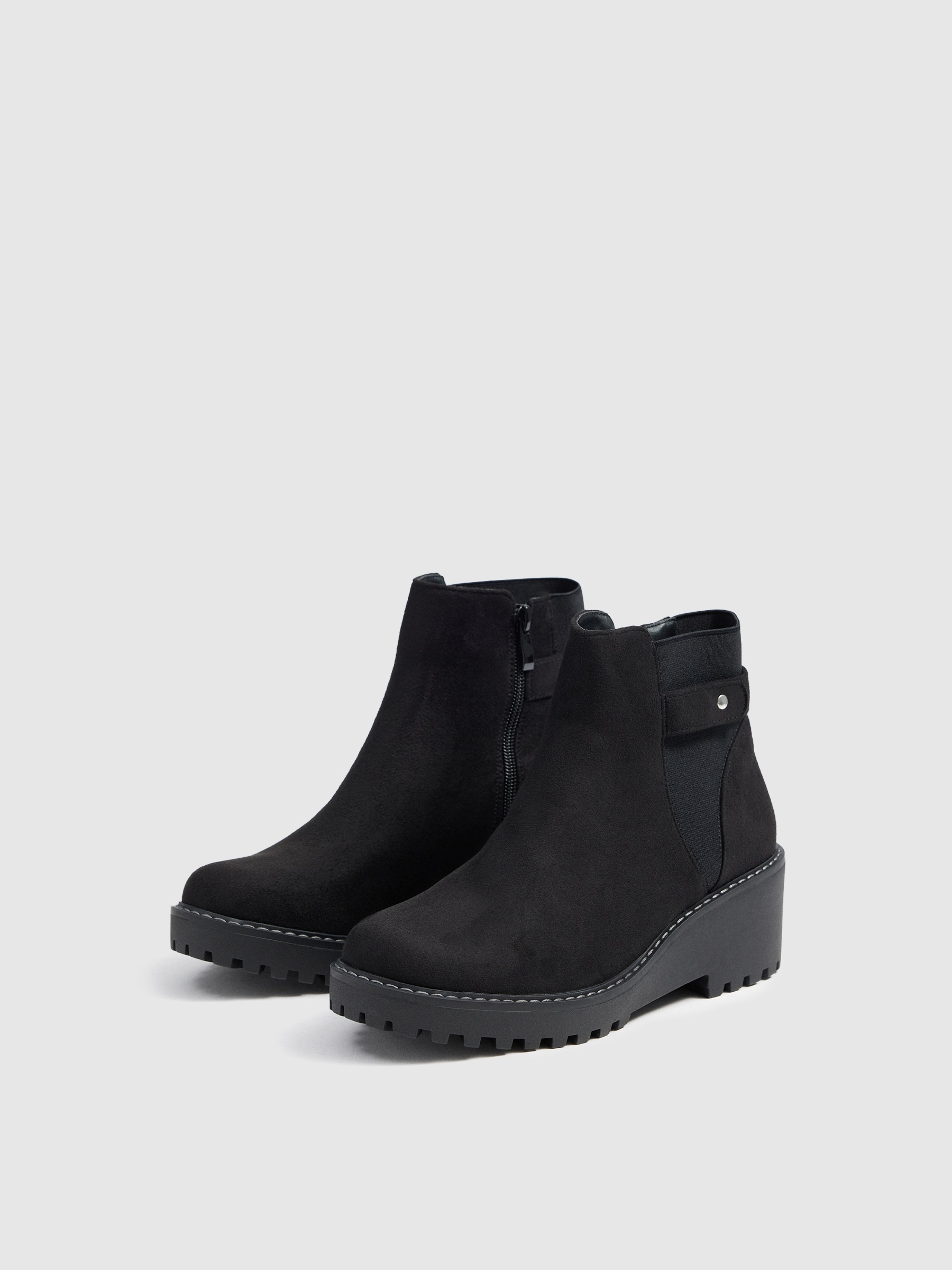 Wedge and buckle boots