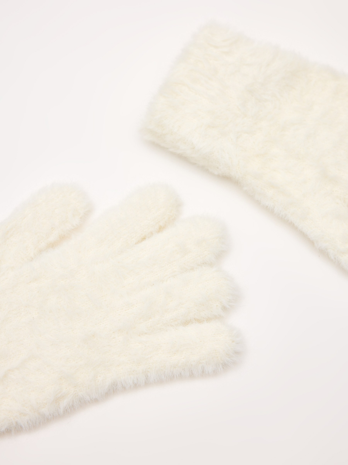 White fur gloves off white detail view