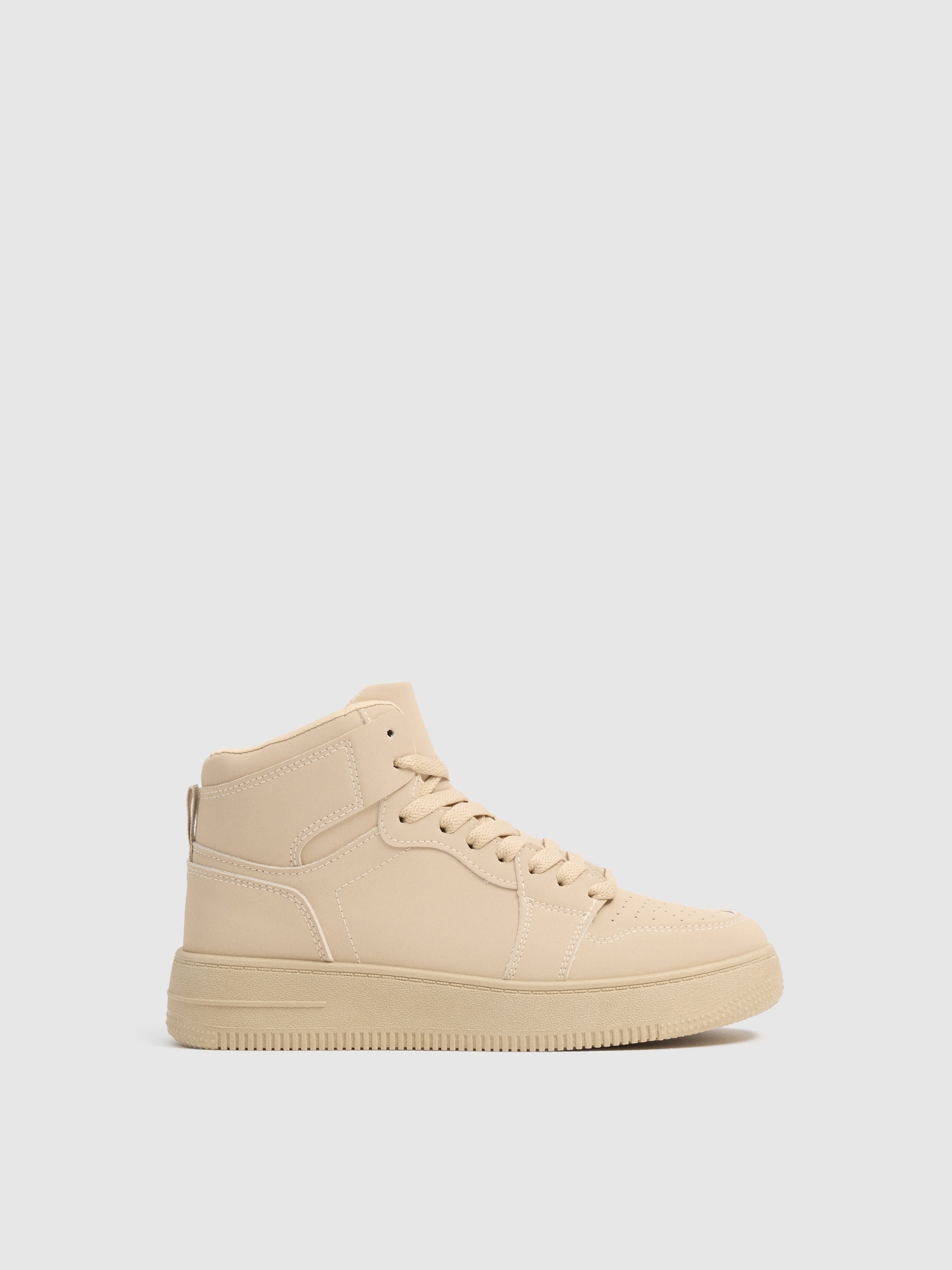 High-top basketball sneakers with platform beige profile view