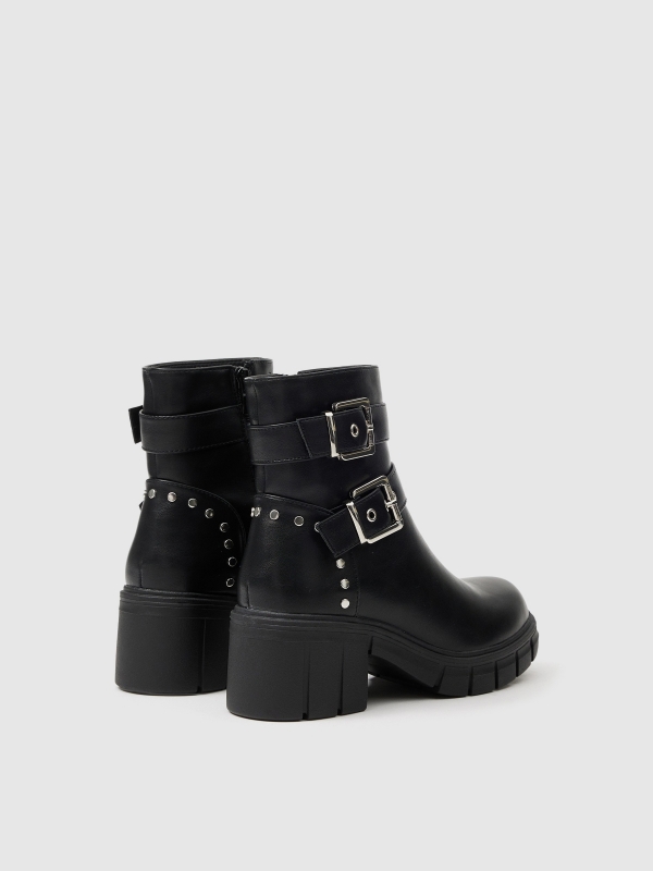 Ankle boot with track sole buckles black 45º back view