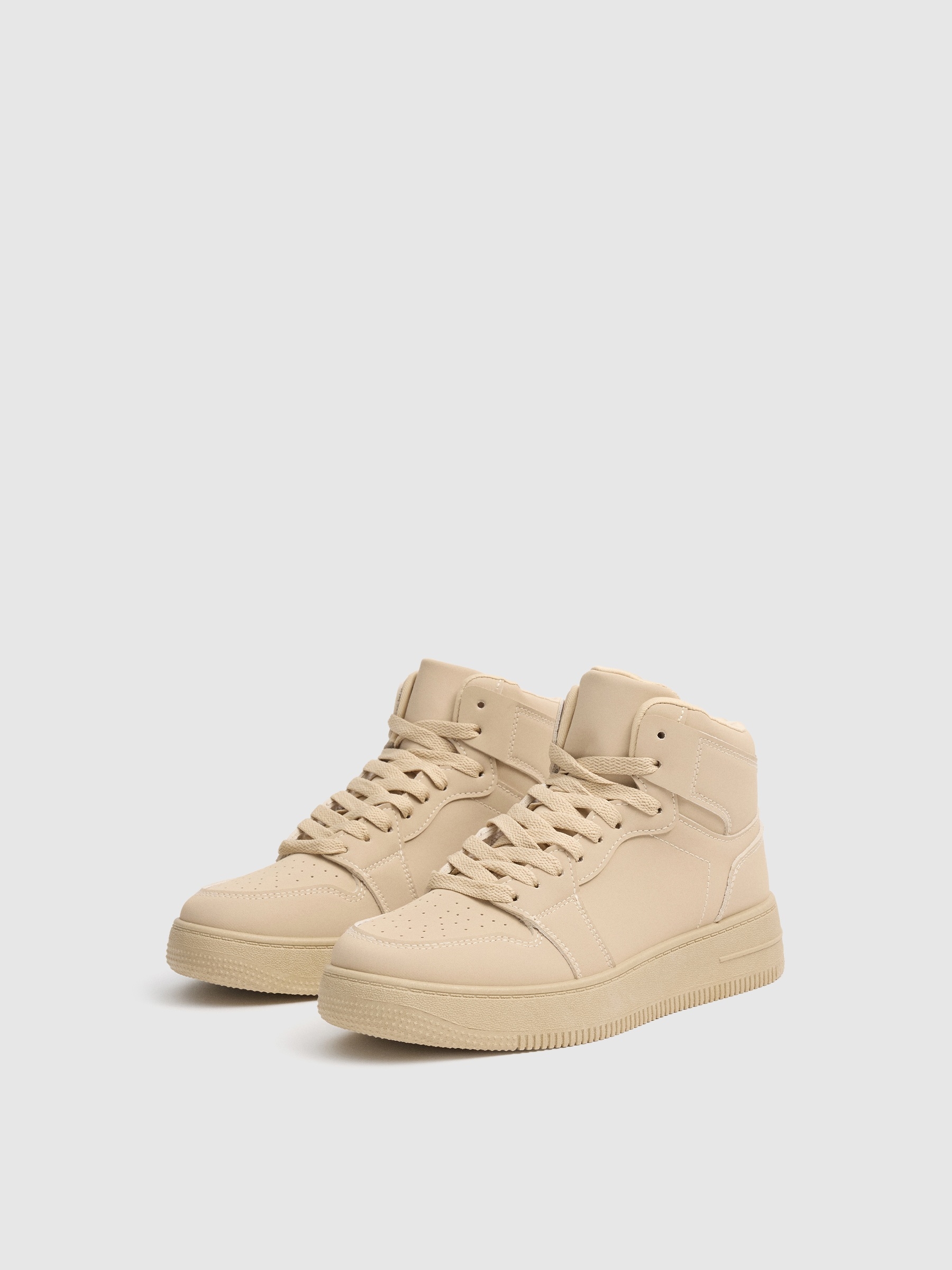 High-top basketball sneakers with platform beige profile view