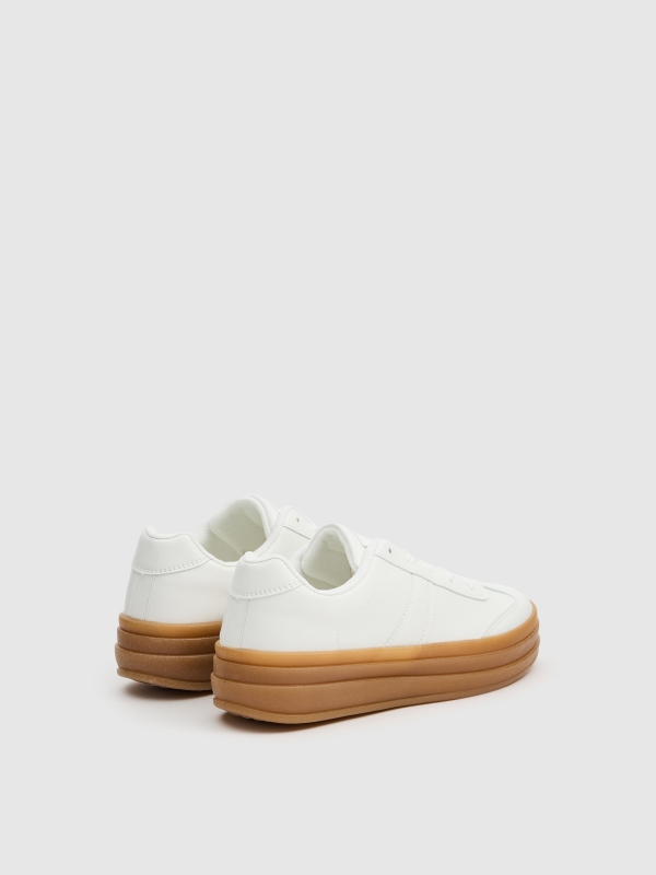 Zapatillas retro con plataforma blanco vista trasera 45º