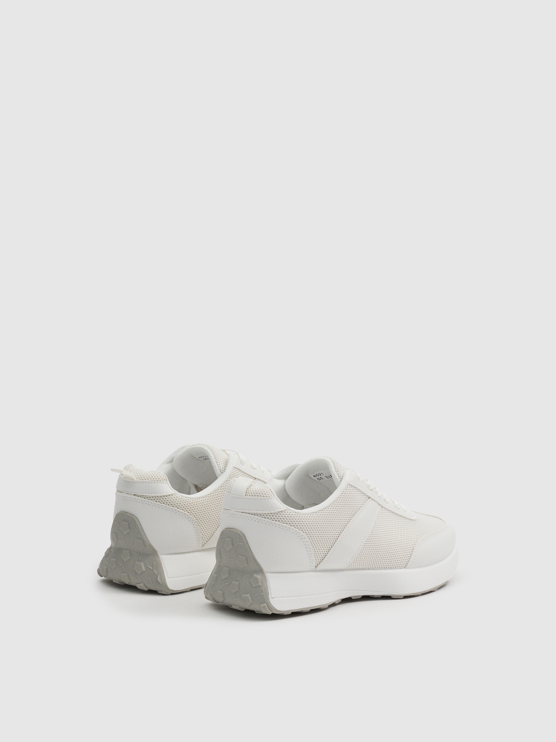 Zapatillas casual running blancas blanco vista perfil