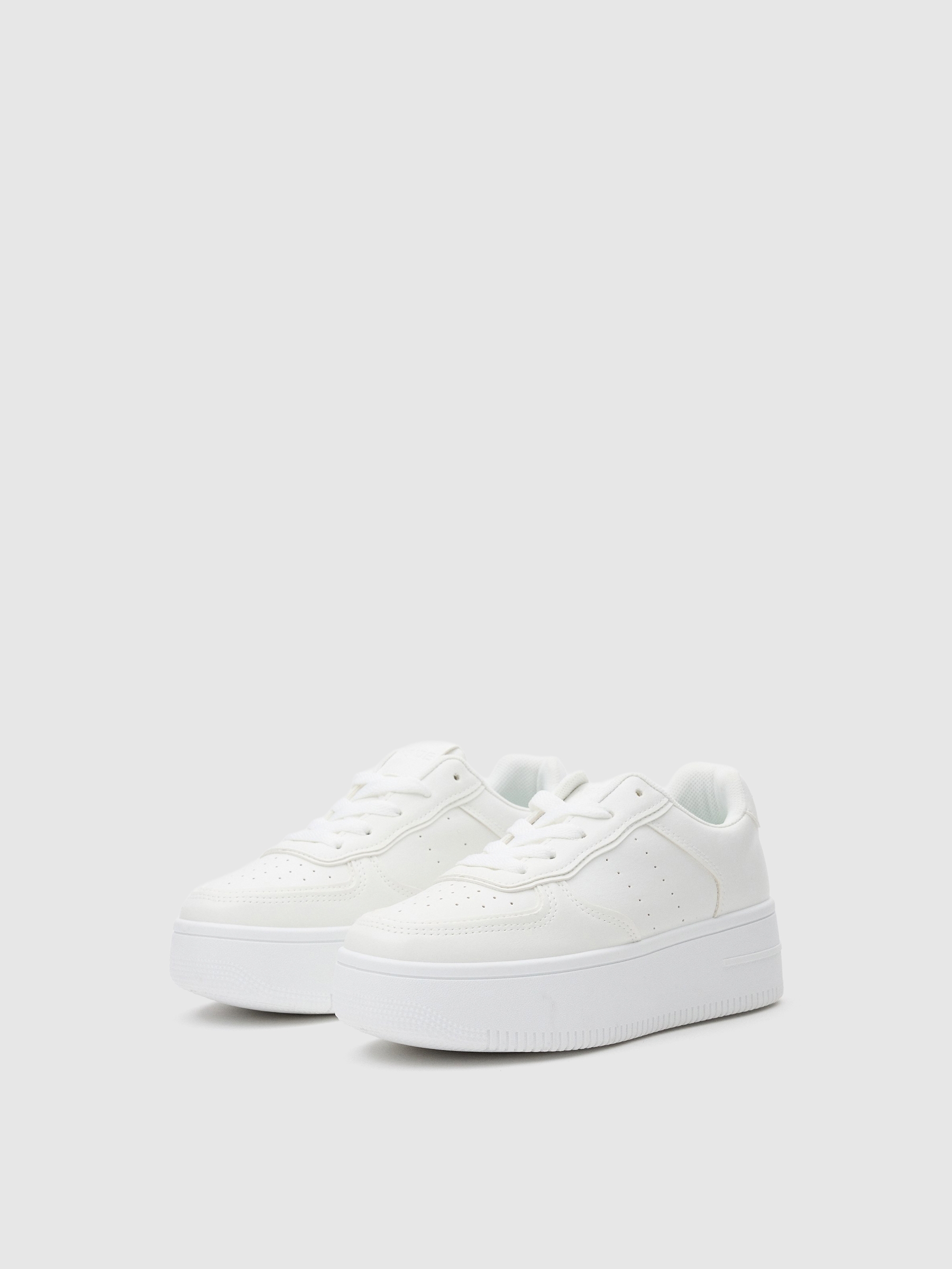 Zapatillas bajas con plataforma blancas blanco vista perfil