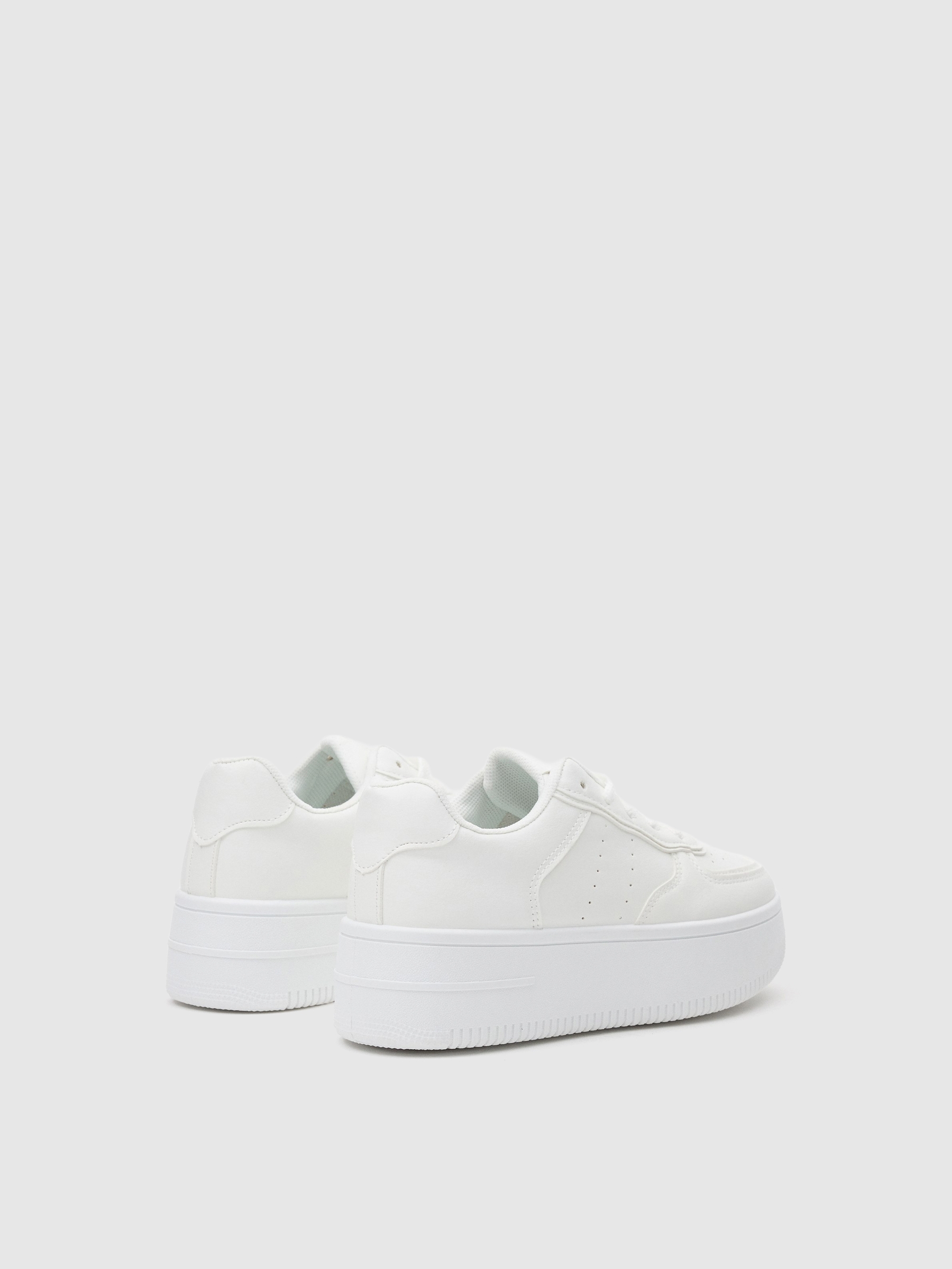 Zapatillas bajas con plataforma blancas blanco vista perfil