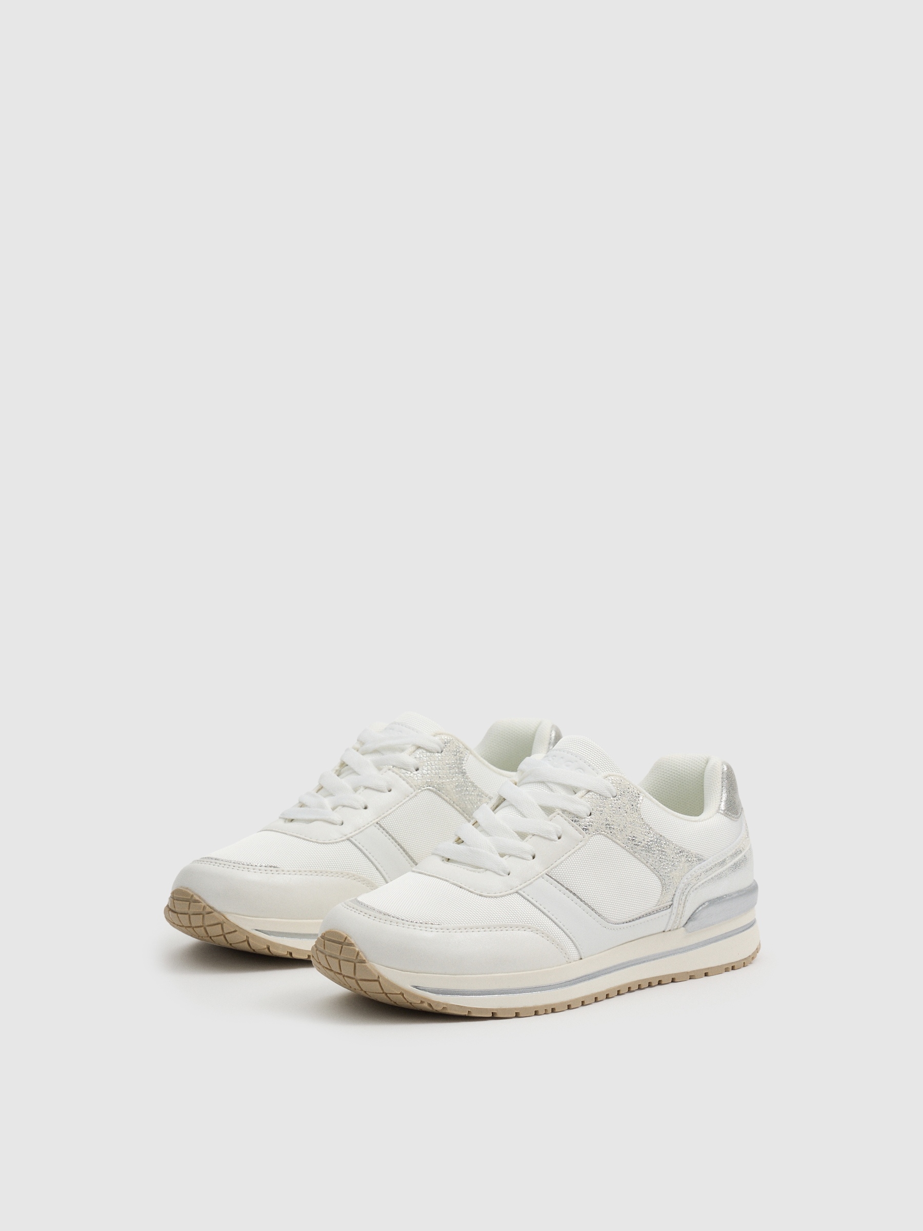 Zapatillas casual running blanco vista perfil