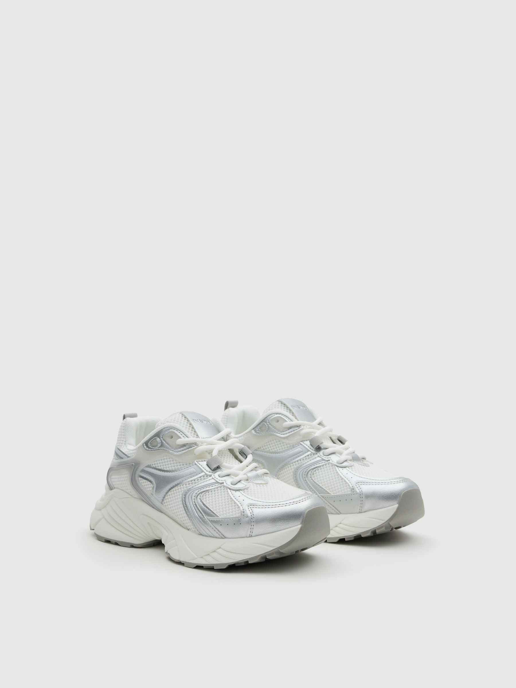 Zapatillas running metalizado blanco
