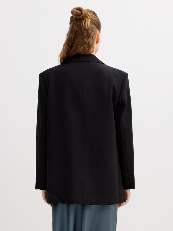 Blazer cruzada oversize negro vista media trasera