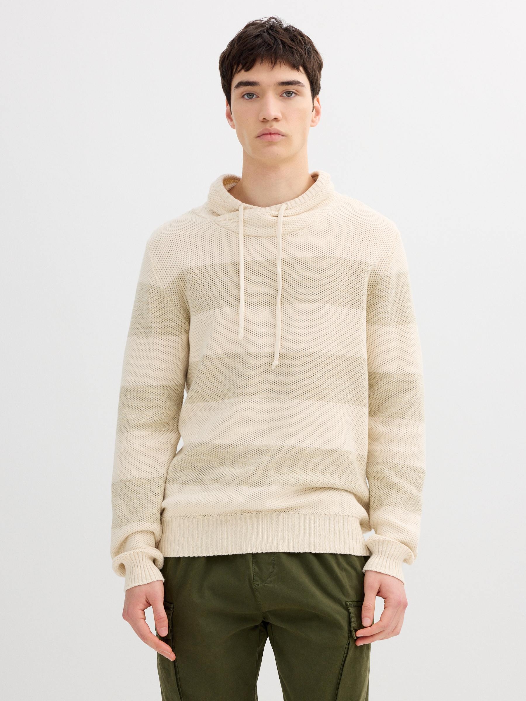 Striped knit sweater raw middle front view